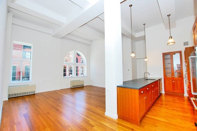 Old World Charm Meets Modern Amenities - Beautiful 2 Bedroom 2 Bathroom Loft Like Residence With 15 Foot High Ceilings And Private Parking Spot For Sale In Prime Brooklyn Heights