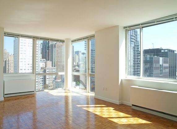 Floor to ceiling corner windows ! Upper West Side Luxury Doorman High Rise . Washer/Dryer in the apartment . Free Amenities ! Steps from Columbus Circle. 