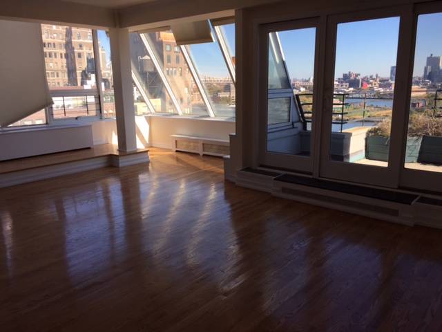 Spectacular River Views From this Duplex Penthouse on East 50th St!