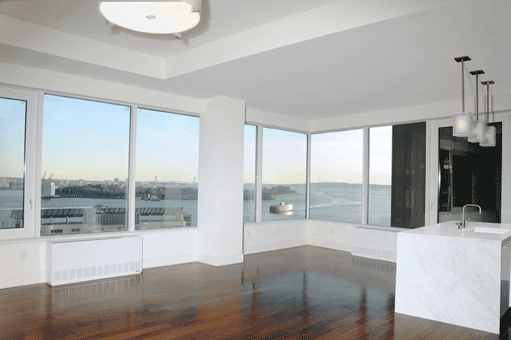 Spacious 2 Bedrooms with Home Office and 3 Baths in Battery Park.Kitchen Island in Italian Marble, Wrap-Around Windows, 10-12' High Ceilings Provide Abundant Natural light with SPECTACULAR Water Views, Red Oak Strip Flooring, and Miele Washer and Dryer.