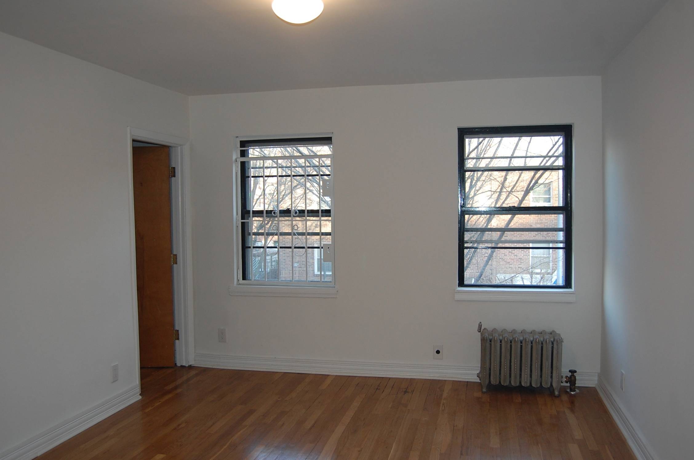 Generously sized 2-bedroom with HUGE backyard in Sunnyside Gardens. Brand New Renovations!!