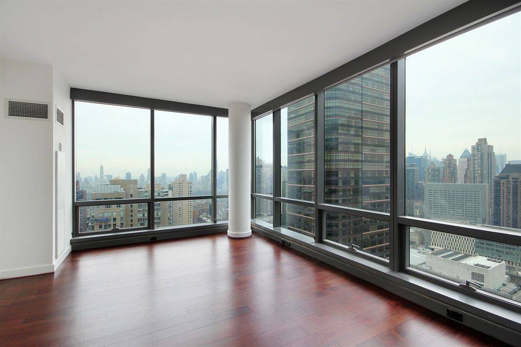  ** Best of the Upper West Side * Lincoln Center  ** Wall of windows * Corner 3 bedroom apartment with amazing NYC Central Park and river Views ! NEW Modern Doorman Luxury High Rise with Free Amenities. 