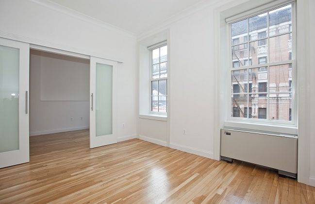 Spacious and Sunny Alcove studio in Downtown Manhattan Premier Luxury Rental * NOHO * Astor Place * Washington Square Park * Doorman Luxury Building with rooftop Pool *  Top Notch Condominium Quality * Free Amenities * Close to Union Square *