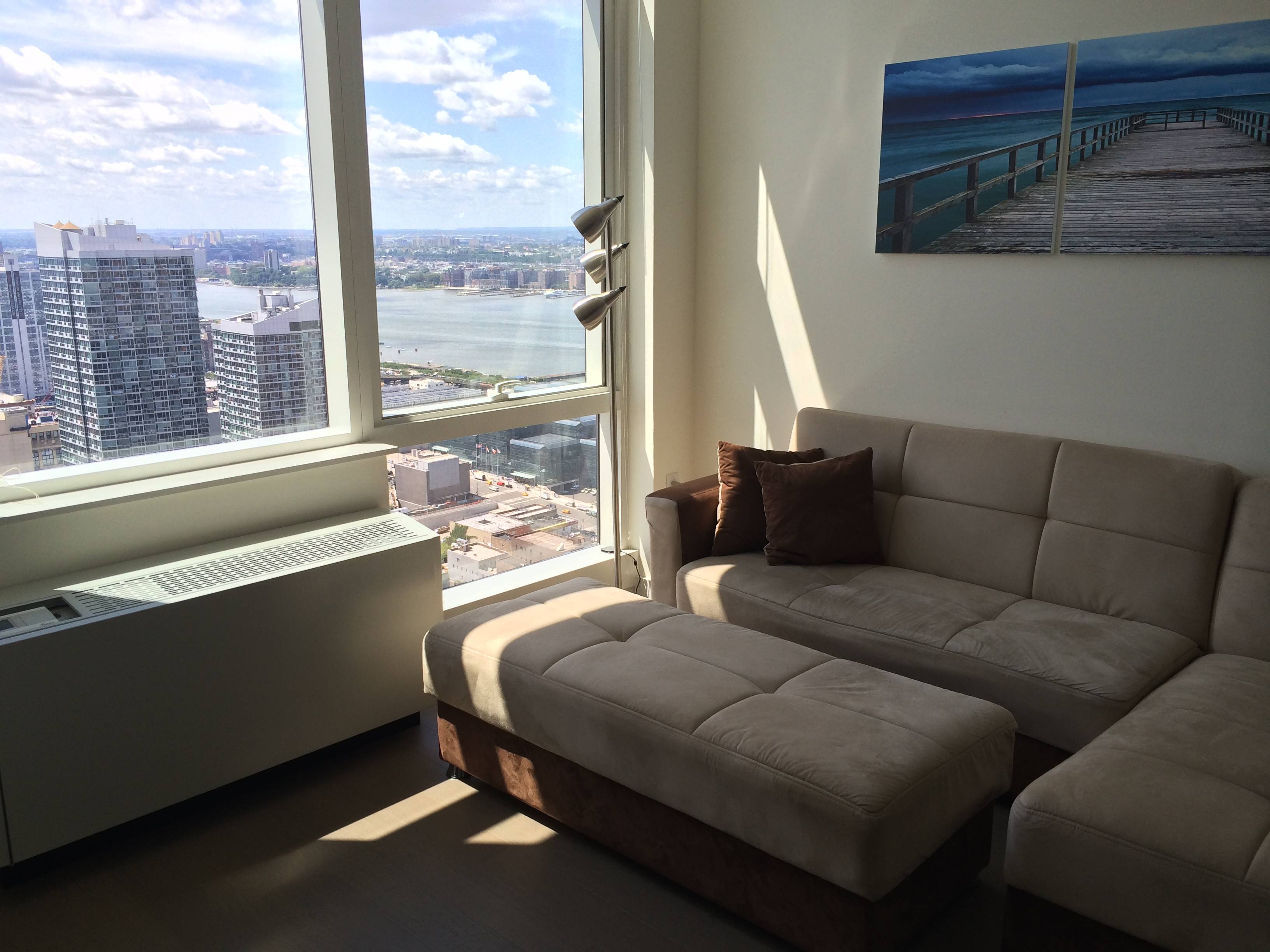 Short term leases ok ! Furnished 800 sq ft Beautiful One Bedroom Apt in Mima Ultra Luxury Tower . Incredible views from the 50th floor- The only floor with EXTRA high ceilings ! Washer/ Dryer in the apt. Equinox health club in the buliding + Much More ! 