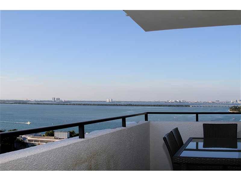 Beautifully remodeled spacious corner unit with expansive bay views