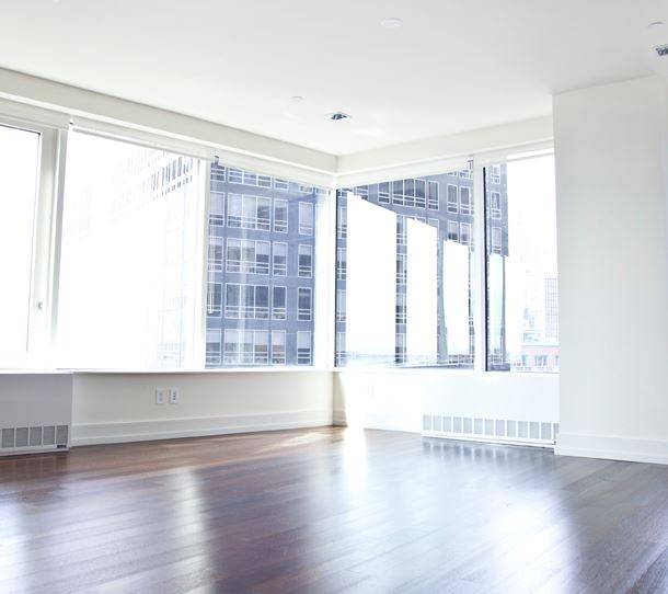 Gorgeous 1 Bed in Financial District - Corner Unit w/ HUGE Windows - $4,395