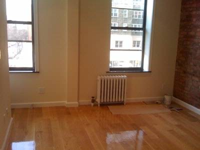 GORGEOUS 2BR/2BATH ON 52ND AND 9TH AV! BRICK WALLS! WASHER/DRYER AND WINE COOLER EQUIPPED! OUTSTANDING!