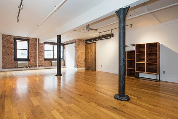 Stylish Loft with Exposed Brick and High Ceilings in DUMBO