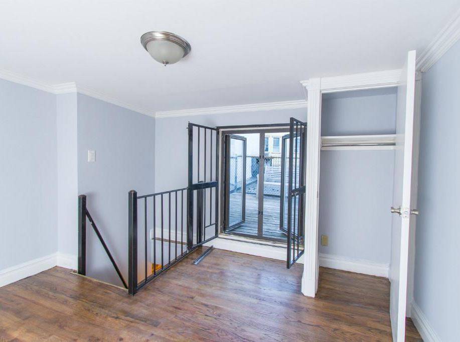 [East Village] - No Fee, Private Roof Deck, Penthouse, Duplex, Exposed Brick, Straight Staircase, Washer/Dryer, Home Office, Pet Friendly