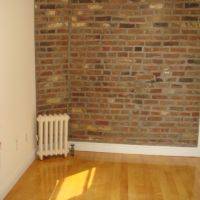Newly renovated One Bedroom on Midtown East with exposed brick wall