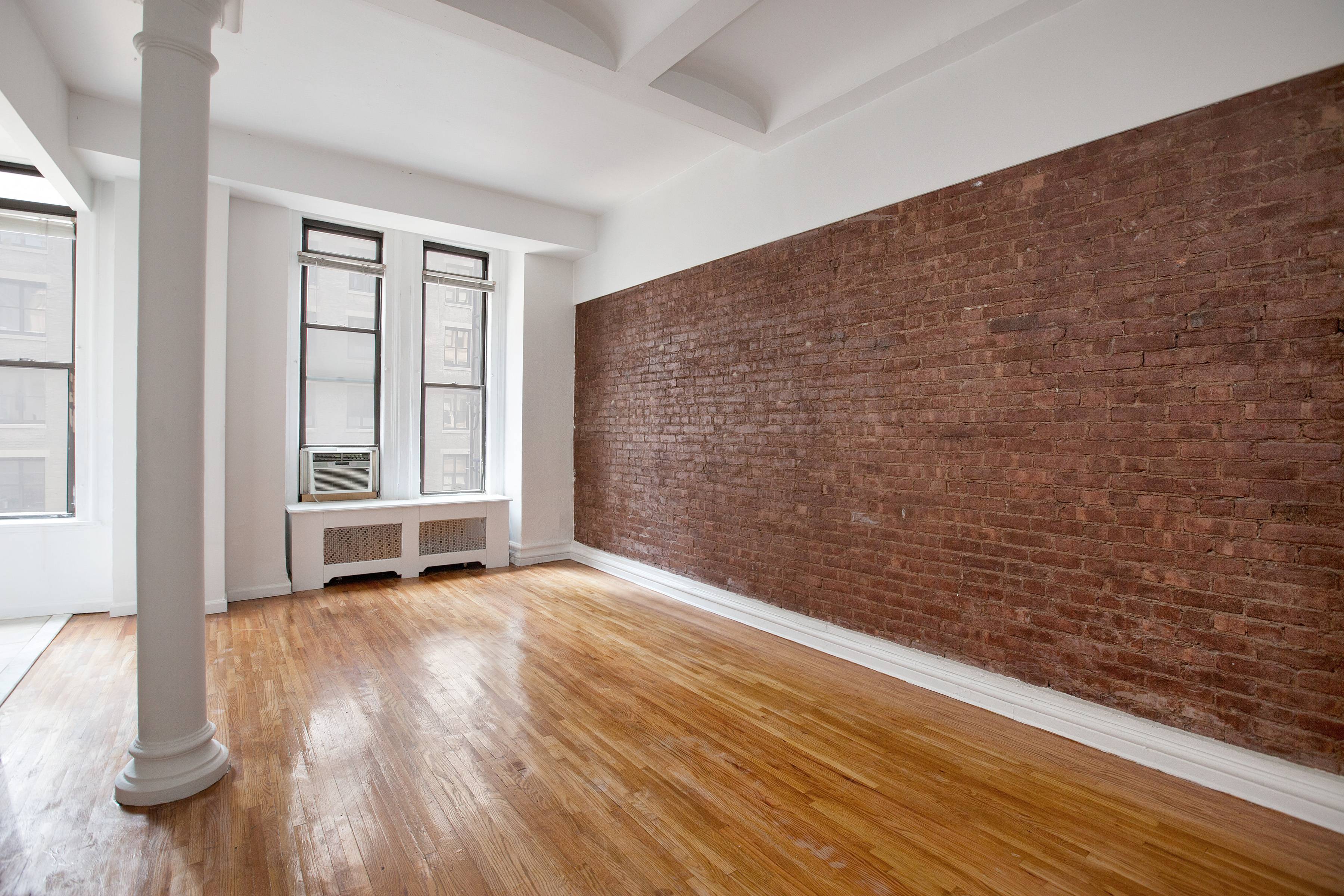 Flatiron LOFT with Park Avenue South View Exposed Brick Over-Sized Windows High Ceilings Pillar One Block To Union Square