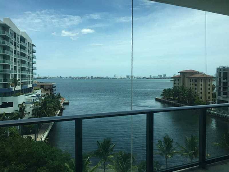IMPRESSIVE PANORAMIC BAY VIEW FROM THIS 2 BED+DEN & 2 BATHS AT ICON BAY