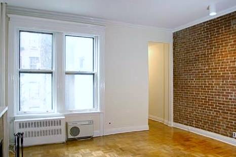 Spacious One Bedroom in the heart of Upper West Side_Exposed Brick_Fireplace_Terrace_Steps from Central Park!