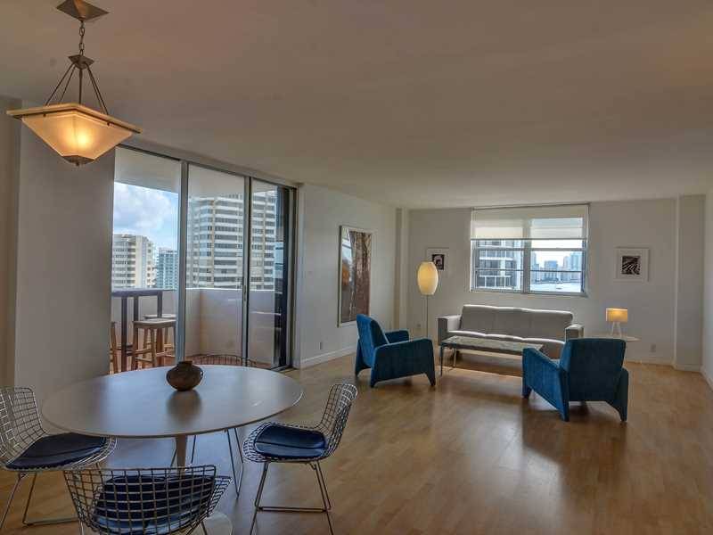 This beautifully updated 2/2 corner unit is light & bright with water and city views from every window