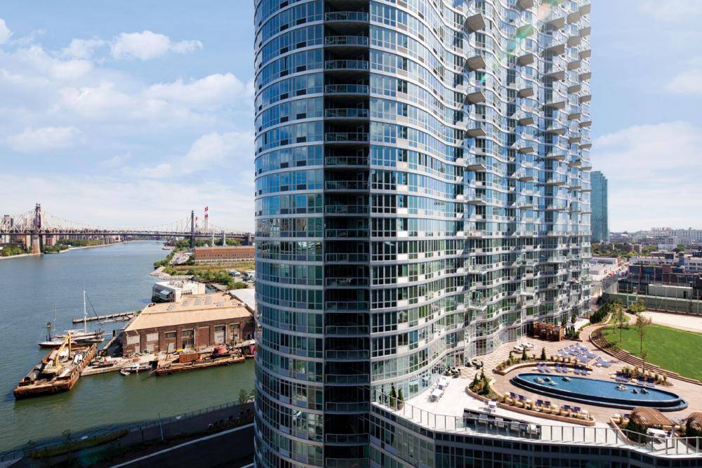 No Fee + One Month OP** $4995 2 bedroom 2 bathroom apartment in Long Island CIty with East River Views 