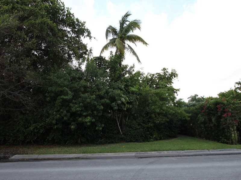 DESIRABLE BUILDABLE LOT ON BAL CROSS DRIVE WITH BEAUTIFUL MATURE TREES IN GATED BAL HARBOUR VILLAGE WITH 24 HOUR SECURITY