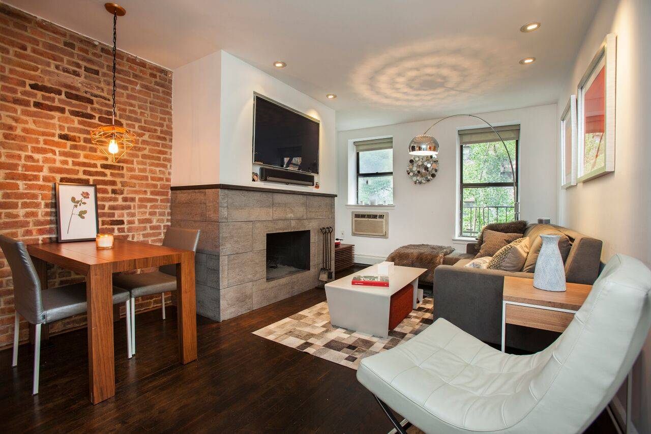 Stunning and stylish newly renovated 1bed/1.5baths duplex with a real woodburning fireplace in Chelsea