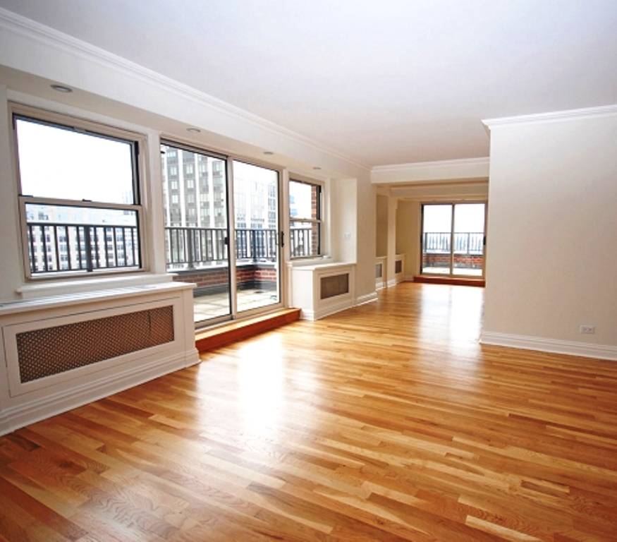 Upscale 2 Bedroom. Open face terrace with impecable city views. Roof top Deck,  garage and No Fee!  East 60's!