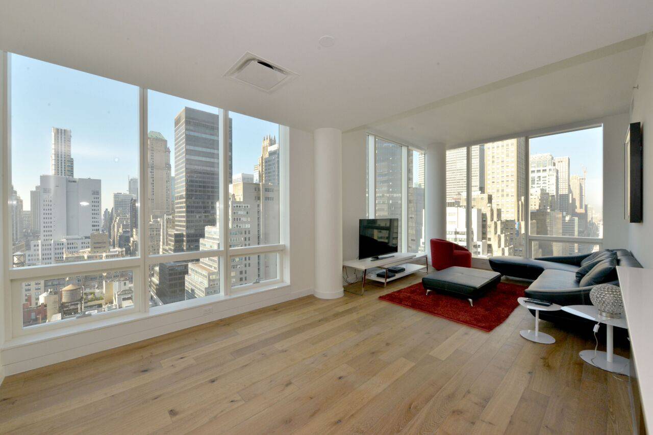 Reach out and Touch the Empire State & Chrysler Building from this  South & North facing 28th floor at 325 Lexington FURNISHED