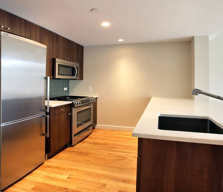 Great Chelsea 2 Bedroom Apartment with 1 Bath featuring a Rooftop Deck and Gym