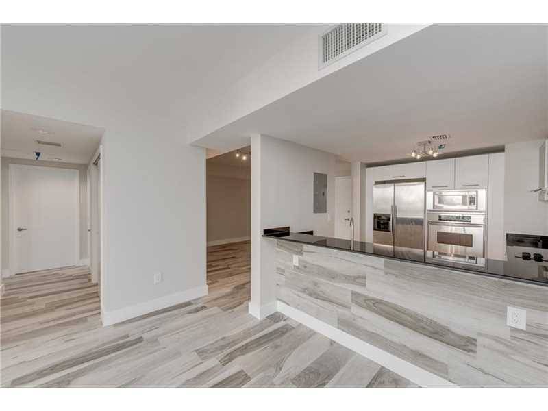 High end finishes & beautiful downtown water views highlight this completely renovated 2bd/2ba unit centrally located in the Nautica Condominium