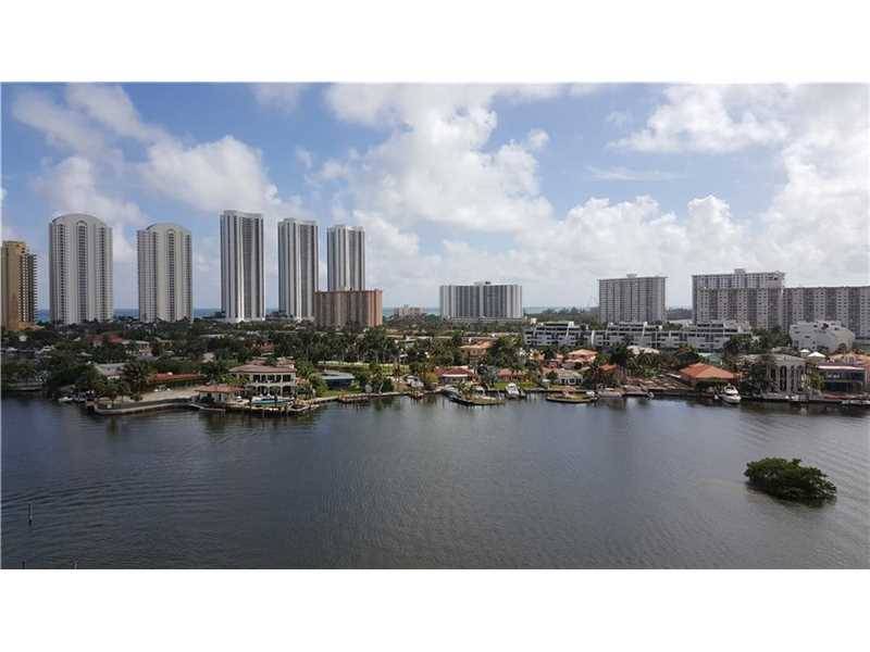 Flow-through corner unit in the best line in this brand new high end building with wide open views of Biscayne Bay and Oleta River Park