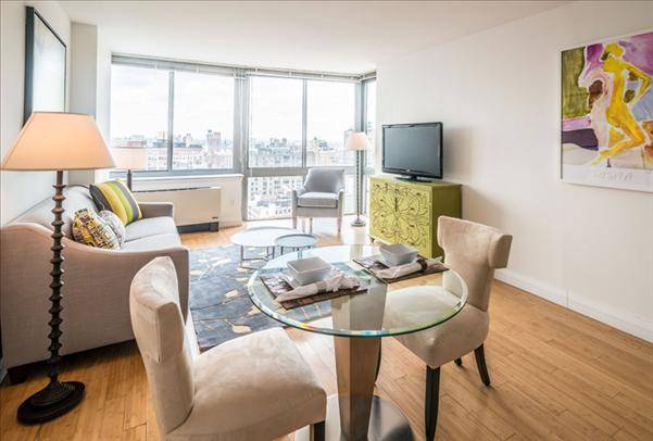 Two bedroom apartment with eat-in kitchen. High floor, spectacular views of the city with Empire State building. Flatiron.