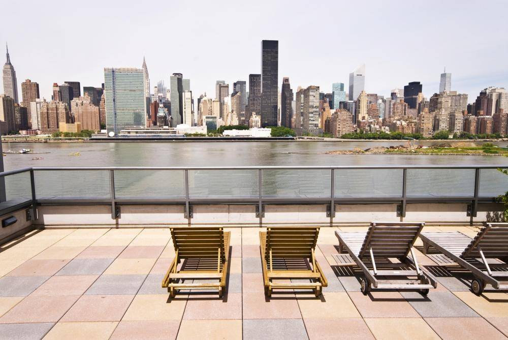 LIC Luxury Waterfront Studio w/Pass-Thru Kitchen | Minutes from Manhattan | Views of LIC | Amazing Amenities | Floor-to-Clg Windows