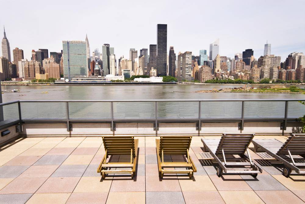 LIC Luxury Waterfront 1 BD w/Pass-Thru Kitchen | Minutes from Manhattan | Amazing Amenities | Floor-to-Clg Windows