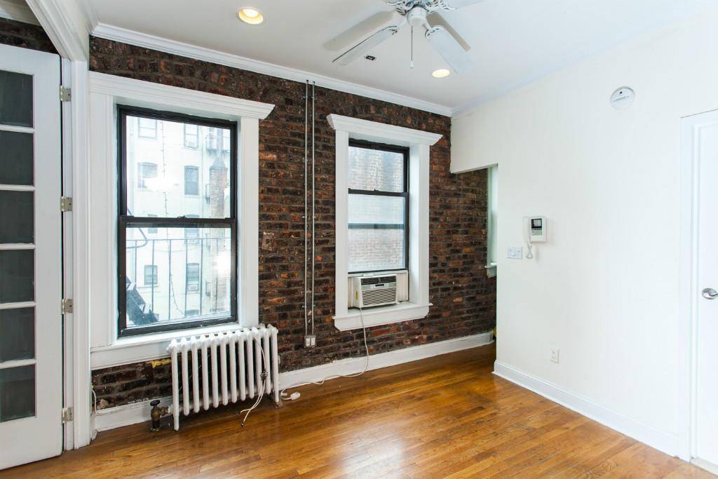 Lovely, Bright 2 Bedroom Apartment With Exposed Brick Walls in East Village.