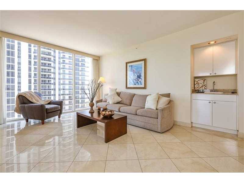 As you enter into this Stunning Residence - Green Diamond 2 BR Condo Miami Beach Miami