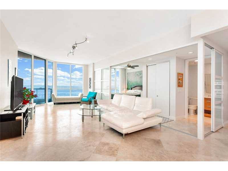 Spectacular direct ocean views welcome you from each room of this 2BD/2+1BA 1