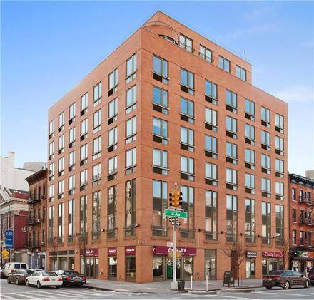 3 Commercial Spaces & Two Indoor Parking Spots For Sale in East Harlem