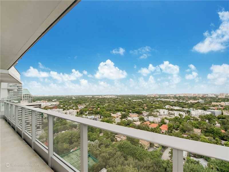 Endless bay and city views from this spectacular corner unit at Grovenor House