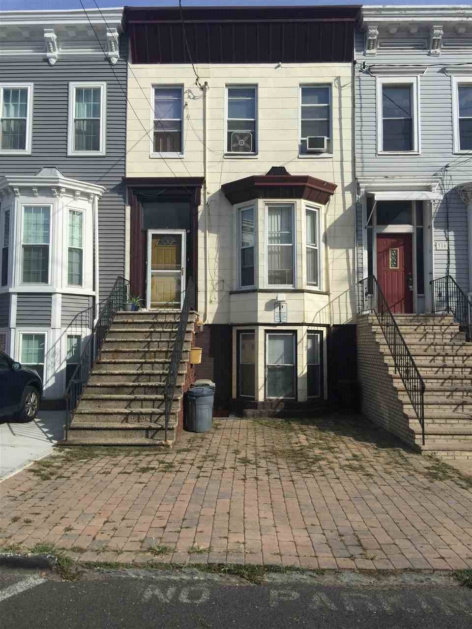 GREAT ROW HOUSE ON BEAUTIFUL JERSEY CITY HEIGHTS BLOCK IN NEED OF TLC