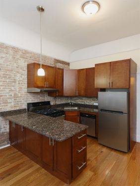 Upper West Side: 1 Bedroom with Exposed Brick and Decorative Fireplace