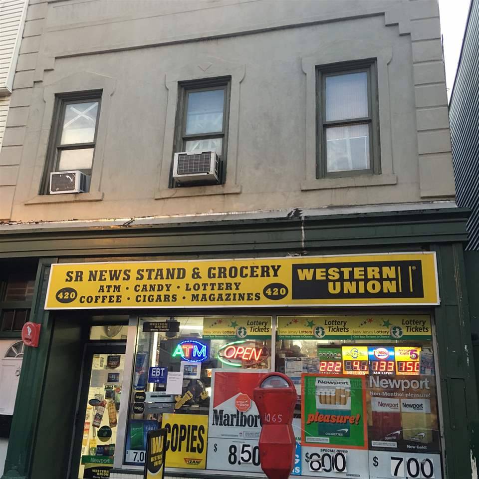 Calling all investors - prime mixed use building on a 25x100 lot on Central Avenue in the booming Jersey City Heights