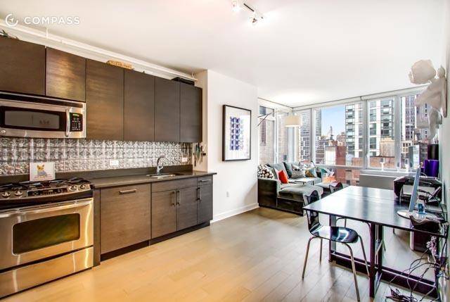 No Broker Fee!  Limited Time Only!  Mint Midtown East Studio Apartment with 1 Bath featuring a Fitness Center and Rooftop Deck