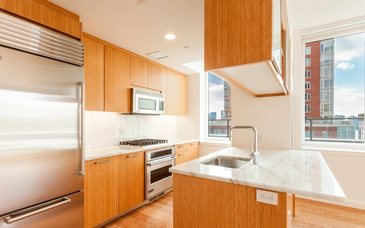 No Broker Fee + 1 Month Free Rent!!!  Limited Time Only!!!   Beautiful Battery Park City 2 Bedroom Apartment with 2 Baths featuring a Fitness Center and Rooftop Deck