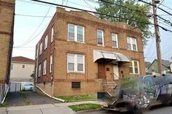 Well maintained brick 2 family attached house (left hand side) with EZ access to NYC transportation