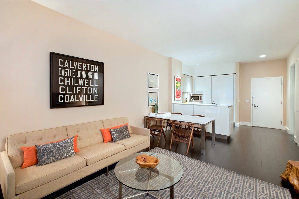 Financial District Two Bedroom / Two Bath  features gourmet kitchen, marble bath in the master bath, dark wood floors, high ceilings and washer/dryer in apartment.