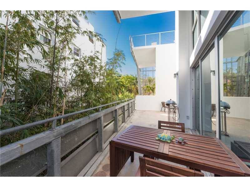 Come and live in this urban oasis located in a trendy South of Fifth neighborhood