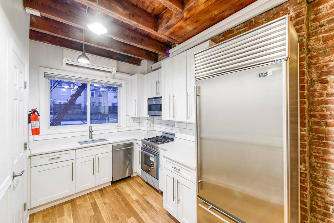 Be the first to live in this renovated home on a quiet tree-lined street in the Historic Van Vorst Park