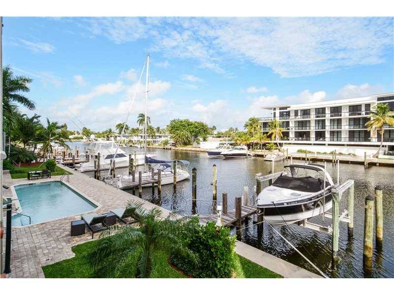 EXQUISITE WATERFRONT CORNER RESIDENCE WITH 50 FT DOCK IN LAS OLAS