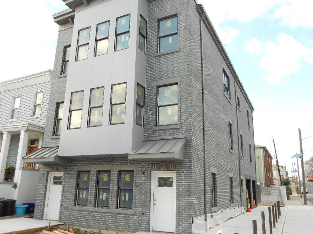 ALL NEW QUALITY CONSTRUCTION-HARDWOOD FLOORS- ROOF TOP GARDEN-NY VIEW-ONE CAR GARAGE