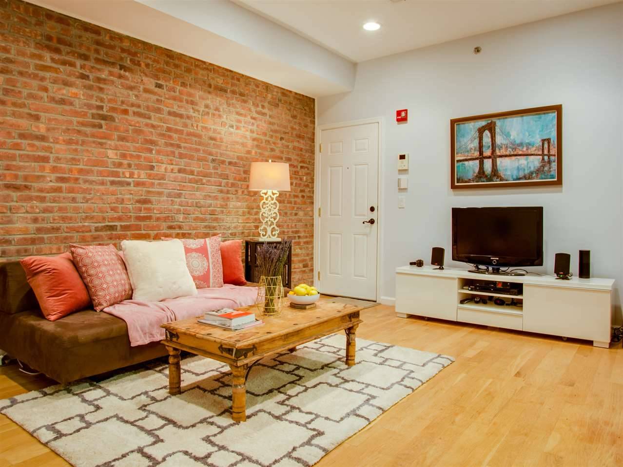 Historic charm meets modern living in this 2 bed/2bath condo at the Juliette