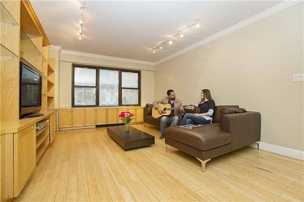 Beautifully Renovated Two Bedroom Residence in a Charming Boutique Condominium steps to Fifth Ave!