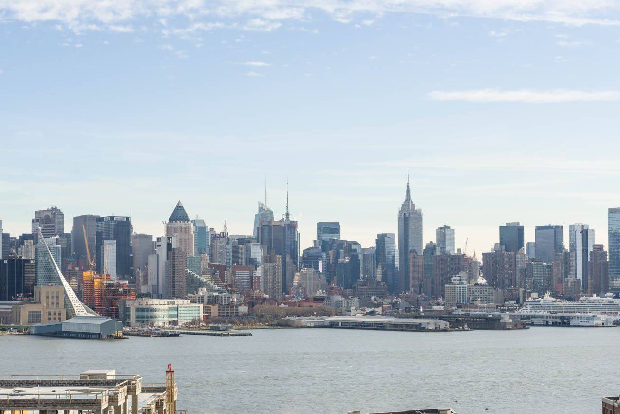 Enjoy the million dollar view of the NYC skyline from this 10th floor condo on the hilltop