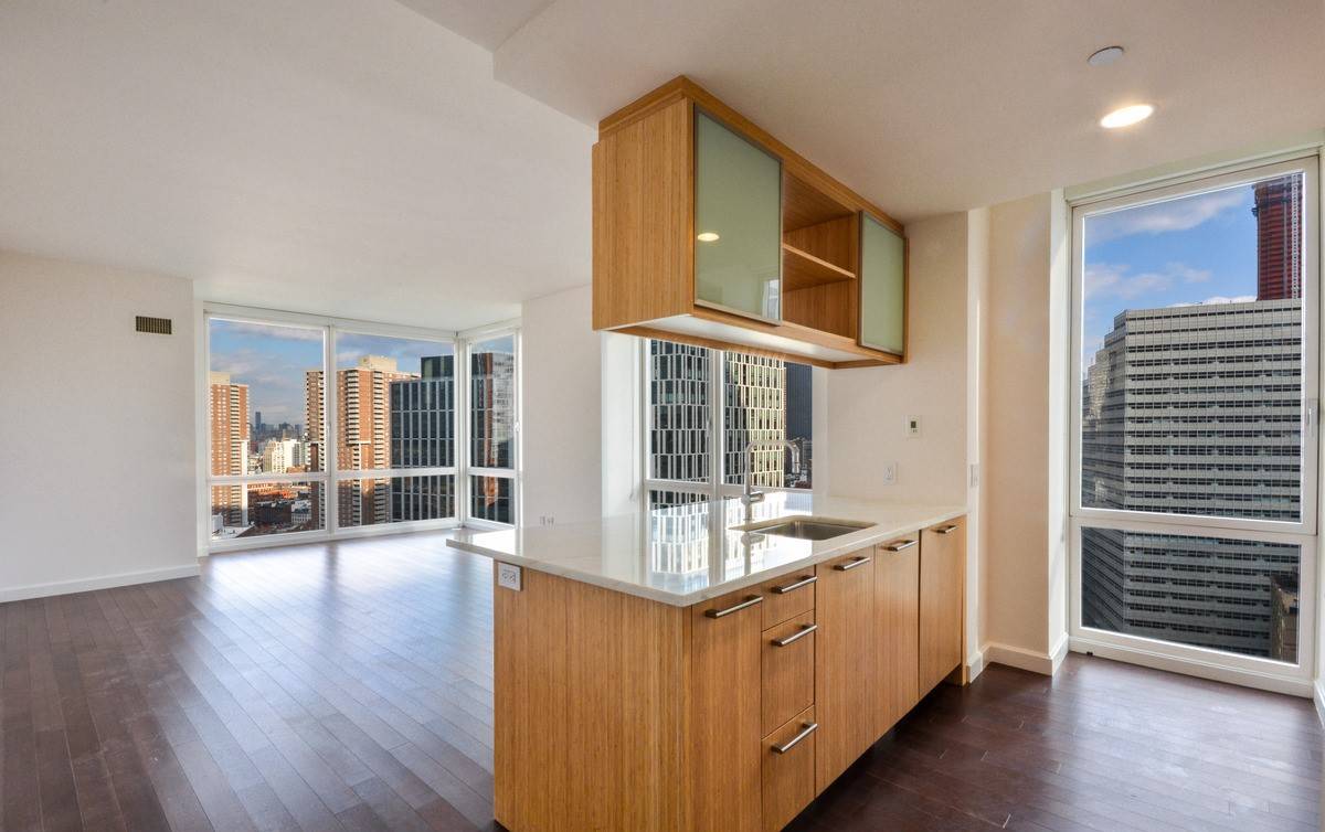 No Broker Fee!!!  Limited Time Only!!!   Brilliant Battery Park City 2 Bedroom Apartment with 2 Baths featuring a Fitness Center and Rooftop Deck