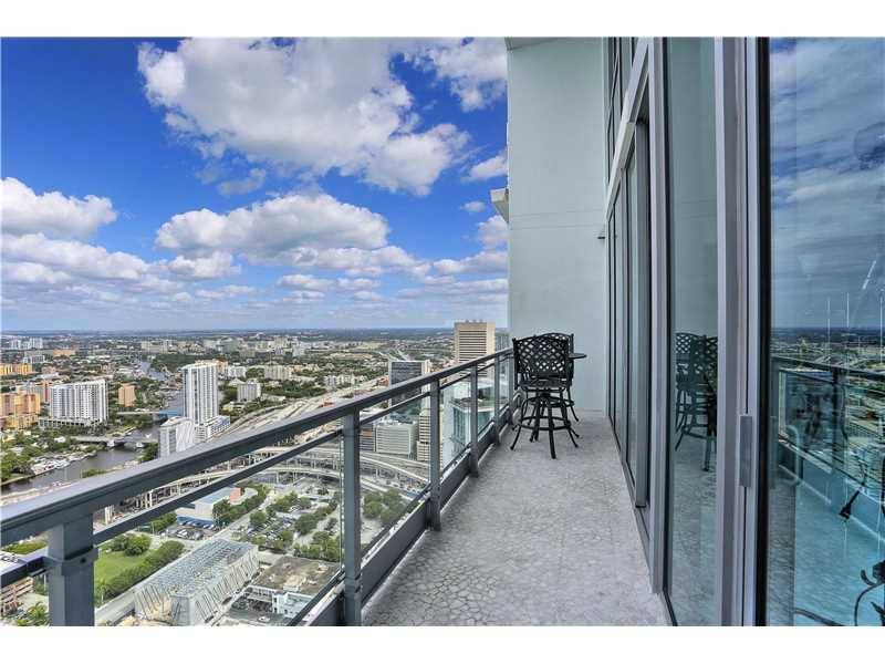Absolutely stunning 3 bedroom at the Mint w/ unobstructed vws of the Miami River and all of Miami from the double-height floor to ceiling windows
